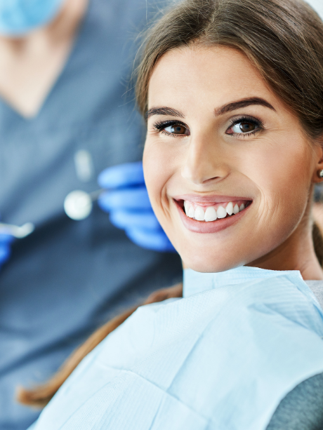 A dentist holding tooth
